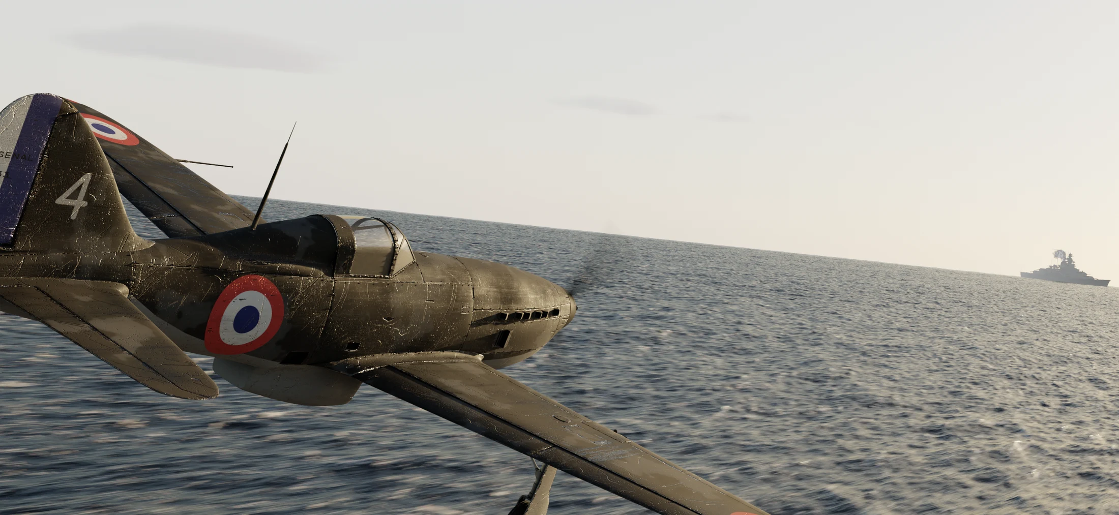 Spitfire banking over water
